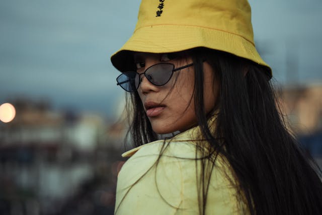yellow bucket hat wearing by a girl